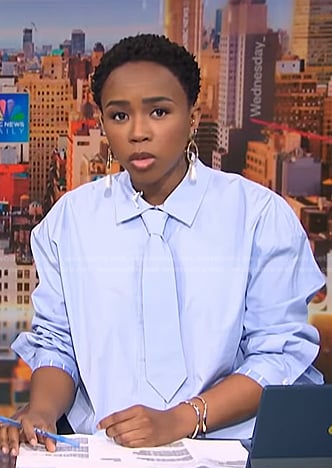 Zinhle's blue tie neck shirt on NBC News Daily