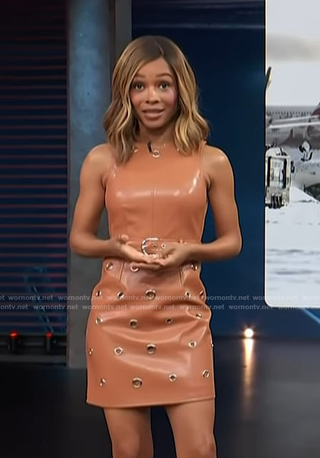 Zuri’s brown leather grommet detail sleeveless dress on Access Hollywood