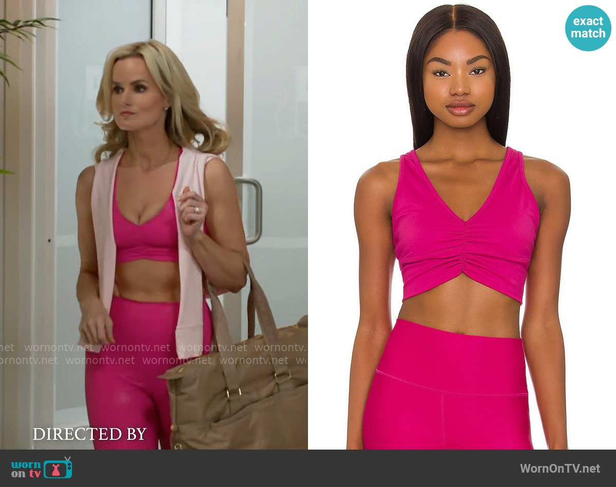 Alo Yoga Wild Thing Bra in Magenta Crush worn by Vanessa McBride (Lauren Buglioli) on Beyond the Gates