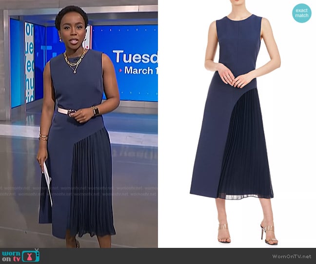 Zinhle’s navy pleated dress on NBC News Daily