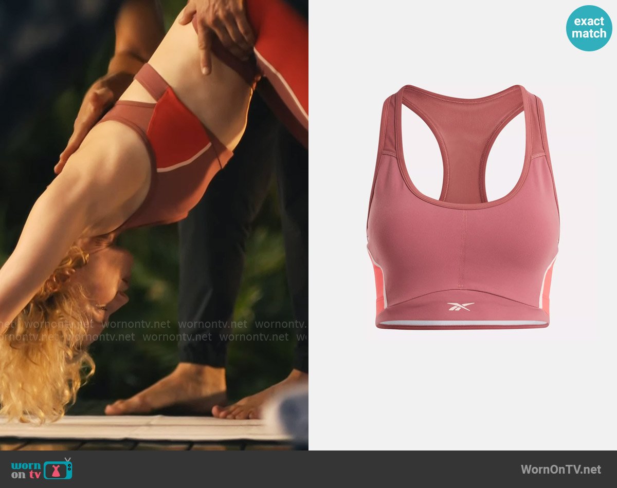 Reebok Lux Racer Padded Colorblock Bra in Sedona Rose worn by Laurie (Carrie Coon) on The White Lotus