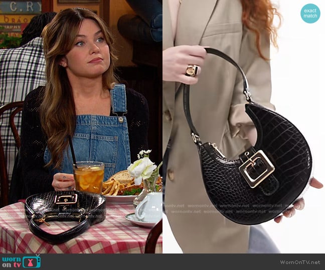 Topshop Suki Buckle Scoop Shoulder Bag in black worn by Joy Wesley (AlexAnn Hopkins) on Days of our Lives