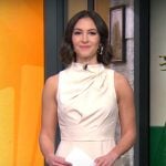 Ali Bauman’s ivory draped midi dress on CBS Mornings