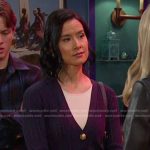 Amy Choi’s navy cardigan and knit skirt with gold buttons on Days of our Lives