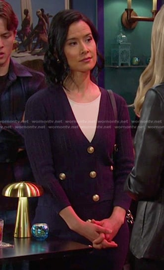 Amy Choi’s navy cardigan and knit skirt with gold buttons on Days of our Lives