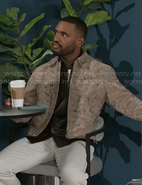 Andre's beige printed jacket on Beyond the Gates