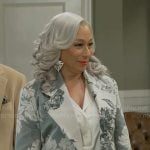 Anita’s grey rose print coat on Beyond the Gates