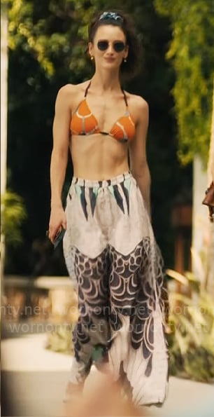 Chloe's orange belt print bikini and black and white pants on The White Lotus