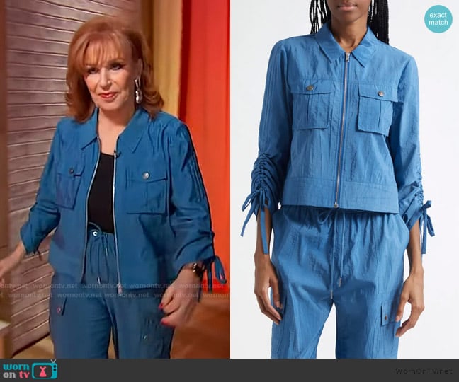 Joy’s blue tie sleeve jacket on Sherri