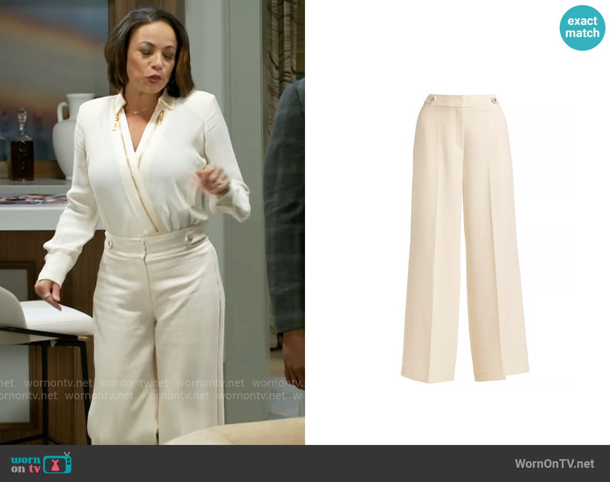 Nicole’s white wide leg pants on Beyond the Gates