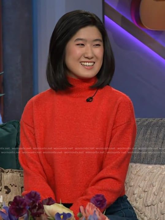 Emma Yang's red knit sweater on The Kelly Clarkson Show