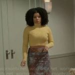 Eva’s yellow cropped turtleneck and printed mesh skirt on Beyond the Gates