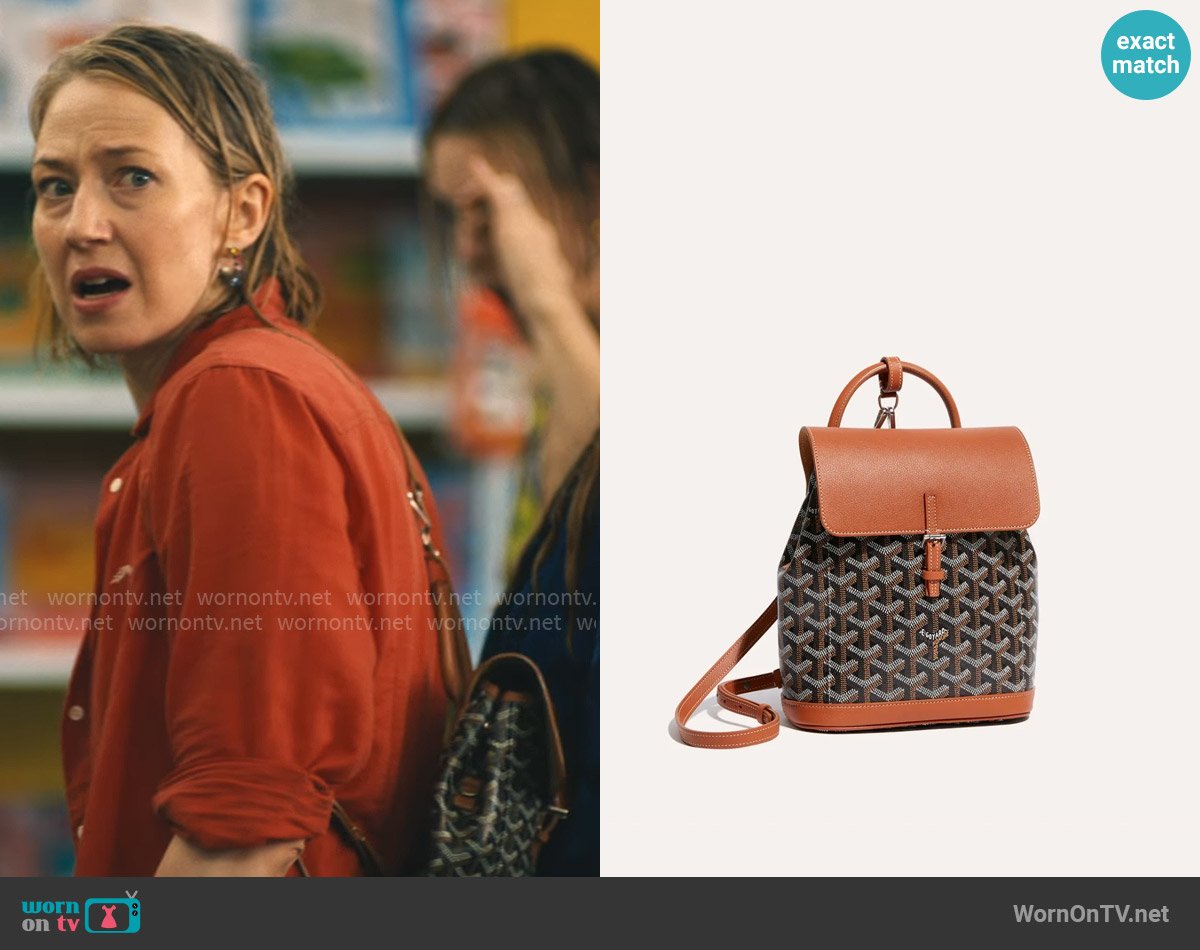 Goyard Alpin Mini Backpack in Black & Tan worn by Laurie (Carrie Coon) on The White Lotus