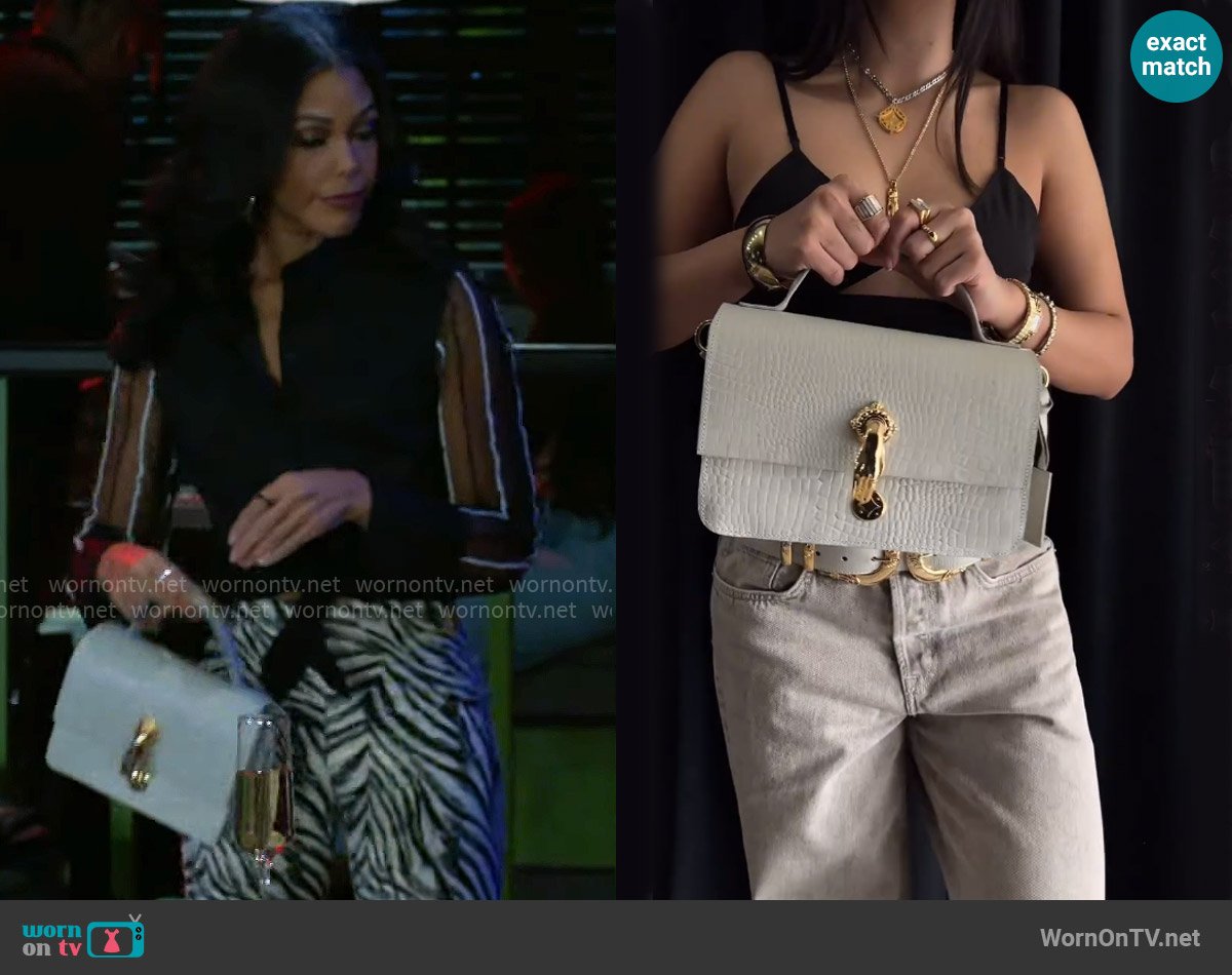 Indigolush Classic Midi Bag Gilded in Ivory worn by Dani Dupree (Karla Mosley) on Beyond the Gates