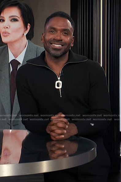 Justin's black half zip sweater on E! News