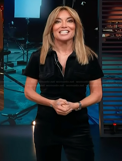 Kit's black velvet jumpsuit on Access Hollywood