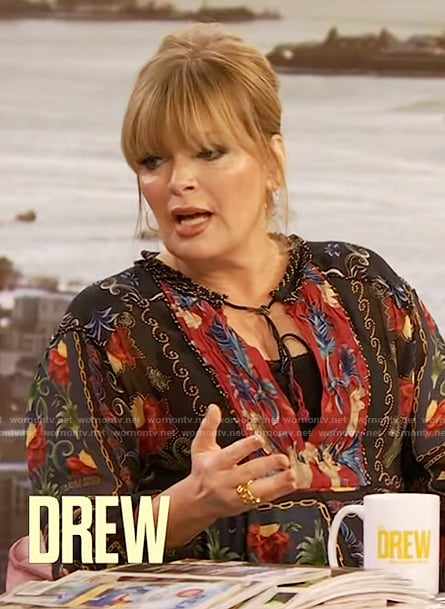 Melissa Peterman’s floral print mini dress on The Drew Barrymore Show