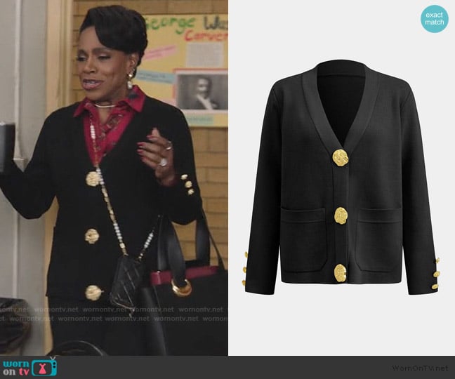 Barbara’s black gold button cardigan on Abbott Elementary