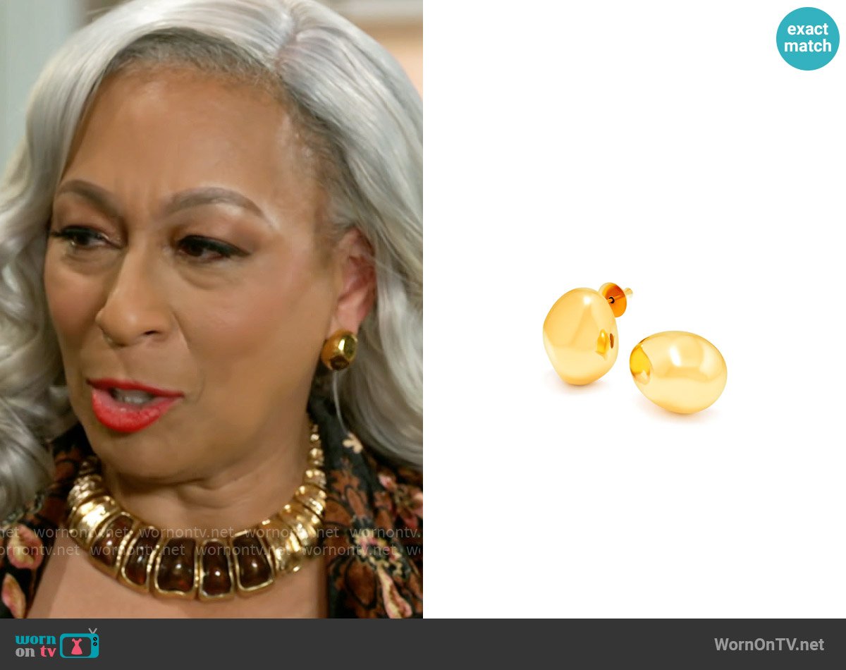 Anita’s stud earrings on Beyond the Gates