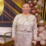 Quiana Burns’s metallic cropped jacket and skirt on Tamron Hall Show