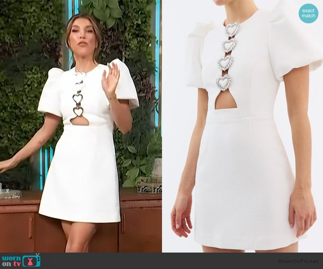 Adrianna Costa’s white heart detail cutout dress on Access Hollywood