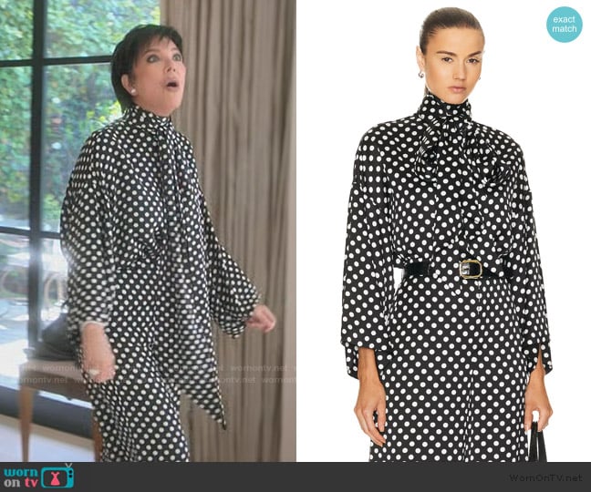 Kris’s black polka dot tie neck blouse on The Kardashians