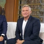 Sam Champion’s black sneakers on Good Morning America