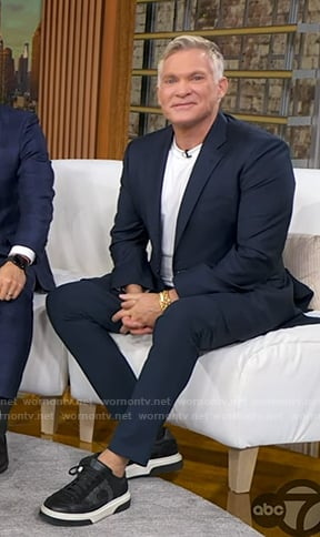 Sam Champion's black sneakers on Good Morning America