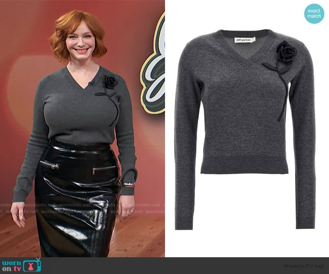 Christina Hendricks’ gray floral sweater on Access Hollywood