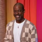 Sterling K. Brown’s check print cardigan on Sherri