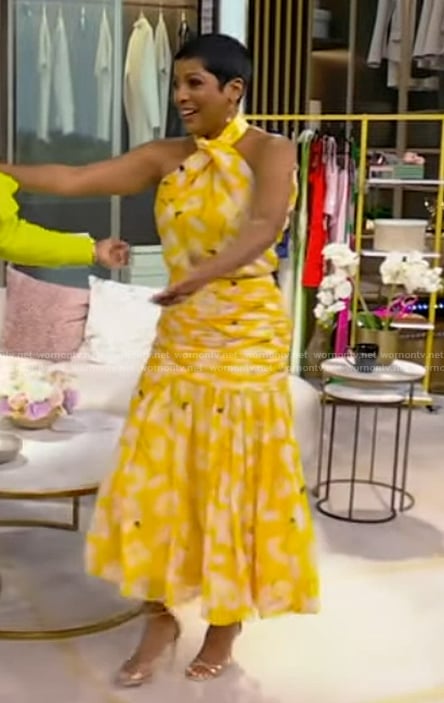 Tamron's yellow floral print top and skirt on Tamron Hall Show