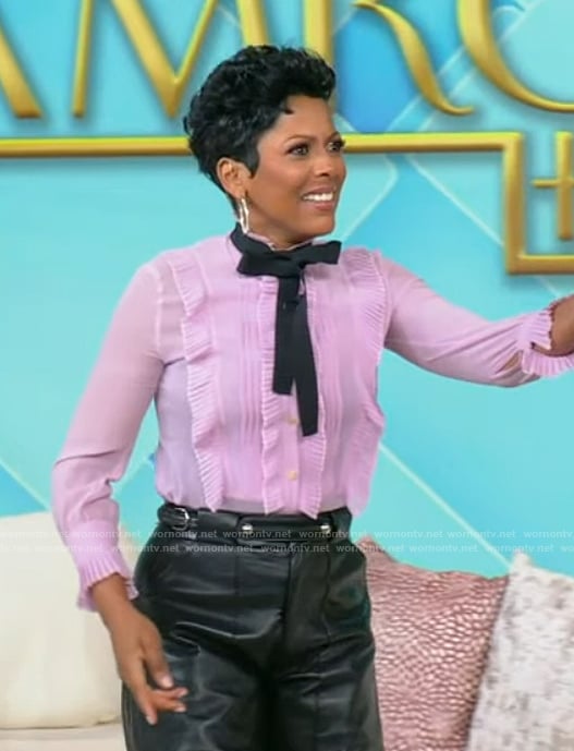 Tamron's pink ruffle tie neck blouse on Tamron Hall Show