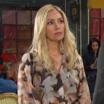 Theresa’s black floral print blouse on Days of our Lives