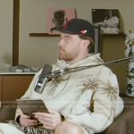 Travis Kelce’s palm tree print fringe hoodie on Access Hollywood