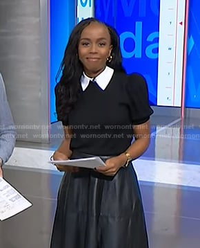 Zinhle's black puff sleeve sweater with collar on NBC News Daily