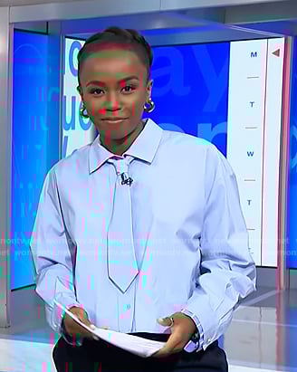 Zinhle's blue tie neck shirt on NBC News Daily