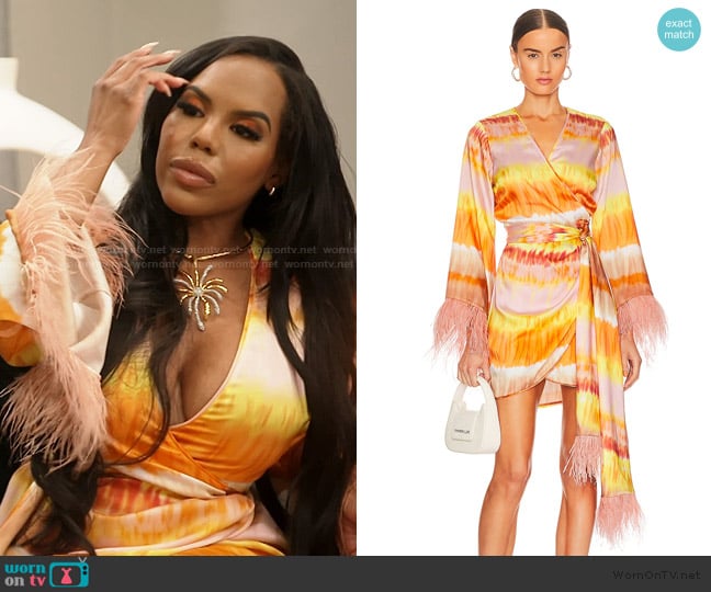 Kelli’s orange tie dye print wrap dress on RHOA