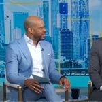 DeMarco Morgan’s white embroidered sneakers on Good Morning America