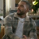 Andre’s plaid zip cardigan on Beyond the Gates