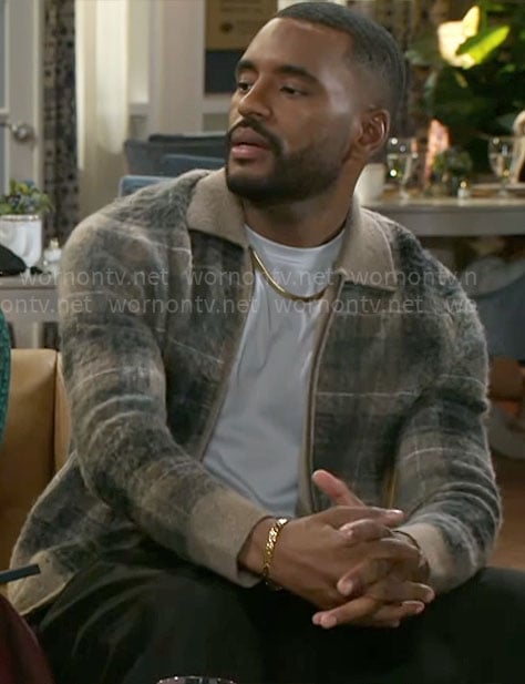 Andre's plaid zip cardigan on Beyond the Gates