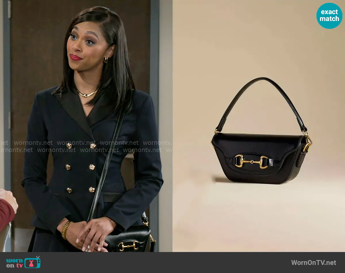Anthropologie The Delilah Bag Horsebit Edition worn by Kat Richardson (Colby Muhammad) on Beyond the Gates