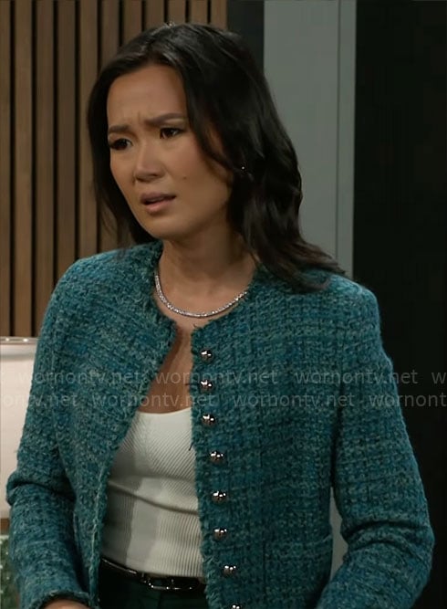 Caroline's teal green tweed jacket on Beyond the Gates