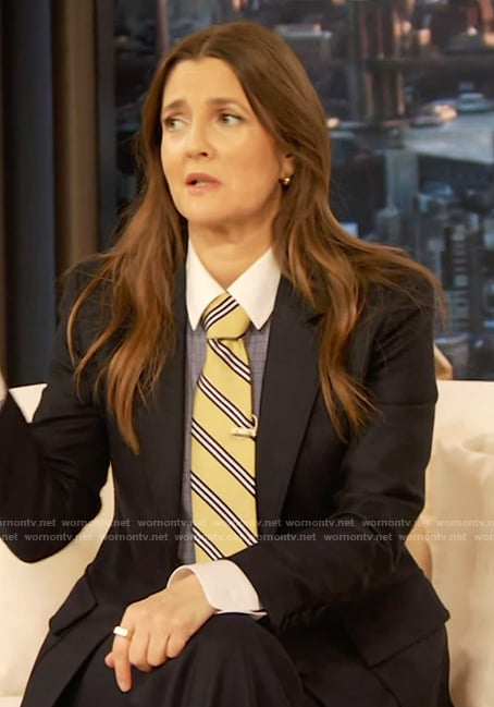 Drew's navy blazer and striped tie on The Drew Barrymore Show