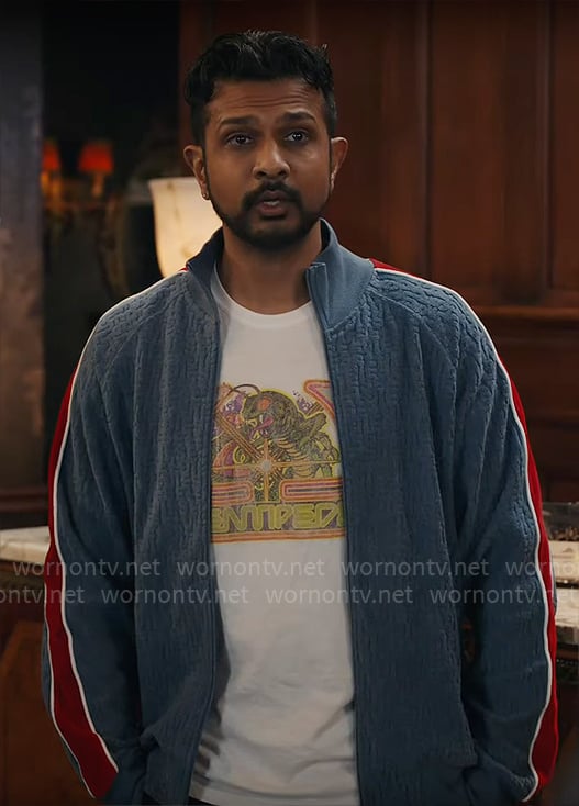 Jay’s blue textured jacket with red striped sleeves on Ghosts