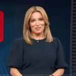 Kit’s navy puff sleeve sweater on Access Hollywood