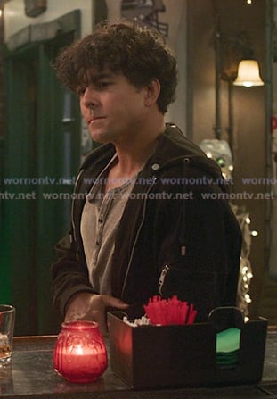 Lucas Adams’s grey henley shirt and black jacket on Greys Anatomy