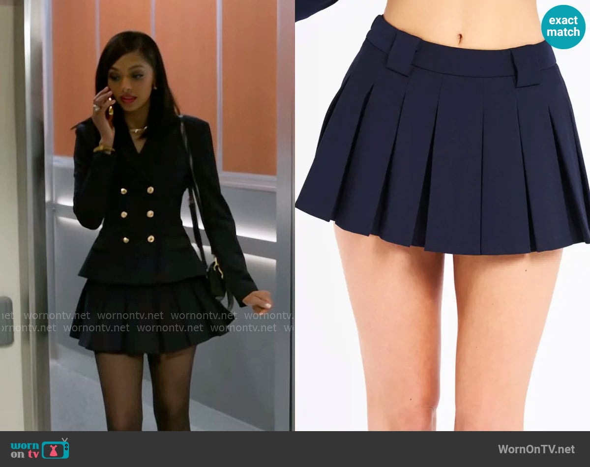 Kat’s navy pleated skirt on Beyond the Gates Kat’s navy pleated skirt on Beyond the Gates