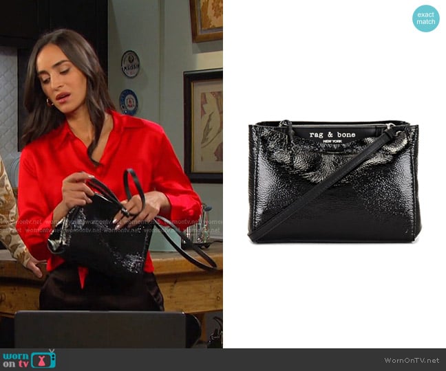 Rag & Bone Passenger Crossbody Bag in Black Patent worn by Gabi Hernandez (Cherie Jimenez) on Days of our Lives