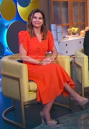 Rebecca Jarvis's orange ruched front dress on Good Morning America