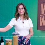Rebecca’s white polo and floral skirt on Good Morning America